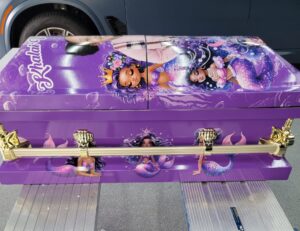 Casket with photos and characters